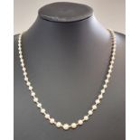 A necklace of graduating natural saltwater pearls,