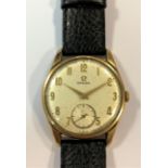 Omega - A gentleman's 9ct gold wristwatch,