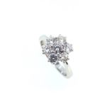 A modern diamond cluster ring,