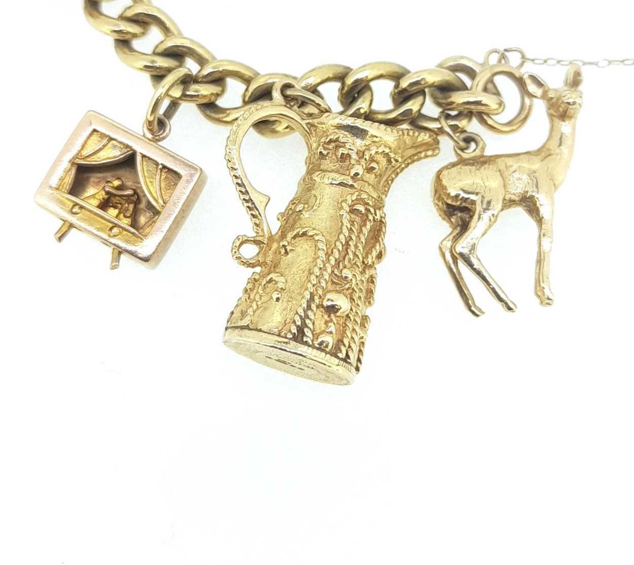 A 9ct gold charm bracelet with many hallmarked charms, - Image 4 of 4