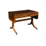 A Regency calamander and satinwood veneered sofa table,