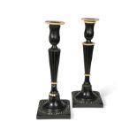 A pair of Anglo-Indian ebony and ivory candlesticks, late 19th century,