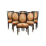 A set of six French ebonised salon chairs, late 19th century,