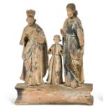 A carved and polychrome painted holy family group, probably 18th century,