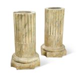 A pair of painted grey simulated marble fluted classical columns, 20th century,