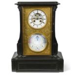 A Victorian black slate perpetual calendar mantel clock,