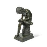 A late 19th century bronze model of Il Spinario, or Boy with Thorn,