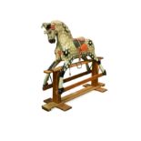 A Dapple Grey painted wood rocking horse, 20th century,