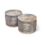 A pair of circular lead planters, 20th century,