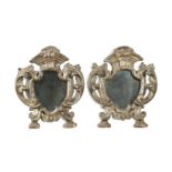 A pair of small Venetian carved and silvered wood wall mirrors, 18th century,