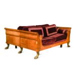 A double sided conversation settee, adapted from a French bedstead,