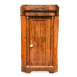 An Empire mahogany standing corner cupboard,