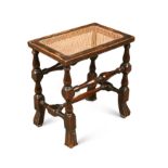 A William and Mary walnut caned seated stool,