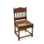 A late 17th century Dutch-Ceylonese hardwood low chair,