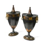 A pair of parcel-gilt and bronzed tole chestnut urns, late 19th/ early 20th century,