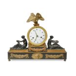 A French Empire gilt metal and bronze mantel clock,