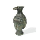 A bronzed copy of a Greek pouring vessel,