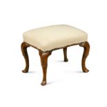 A Queen Anne walnut stool, circa 1705,