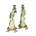 A pair of gilt metal mounted porcelain parrot candlesticks, 20th century,