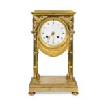 A French Empire ormolu and gilt metal mantel clock,