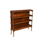 A George IV mahogany and boxwood strung four tier open bookshelf,