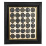 A substantial collection of 19th century historical wax or composition medallions,