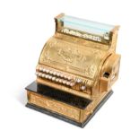 A cast brass National cash register, early 19th century,