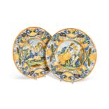 A pair of maiolica chargers, in 17th century Urbino style,