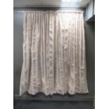 A pair of verticle striped cream coloured curtains (lined) each curtain measures approximately 100cm