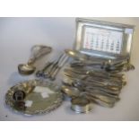 A collection of silver flatware, a silver waiter and a silver napkin ring, 43.8ozt, together with