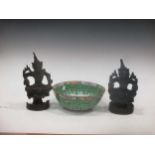 A 20th century Cantonese bowl with repeated butterfly motifs; and two Asian carved deity figures (
