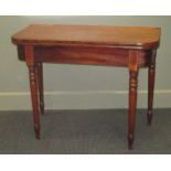 A 19th century mahogany tea table on turned legs 73.5 x 92.5 x 44.5cm