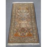 A attractive Kashan wool and silk rug,