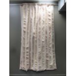 A single verticle striped cream coloured curtain (lined) measuring approximately 140cm wide with a