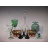 A mixed collection of drinking and other glassware, including two water jugs, a decanter, etc