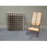 An 20th century caned armchair together with a 72 bottle wine rack 88 x 78 x 23cm (2)