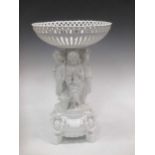 A Continental white glazed figural centre piece, slight damage, cross sword marks (missing fixing