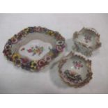 Two Samson armorial scroll salts and a Continental floral dish (3)