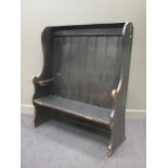 A 19th century stained pine high back tavern settle 146 x 127 x 39cm