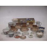 A Royal Worcester miniature part cabinet set, Coalport miniature cup and saucer, 3 tea bowls, an urn