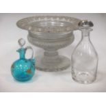 A glass bowl on stand, possibly Irish, in two parts, the bowl with everted rims with alternating hob
