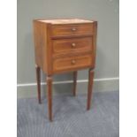 A continental inlaid bedside cabinet comprising of three drawers on fluted and tapered legs 79 x