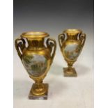 A pair of Paris gilt vases with painted vignettes (damaged) 32cm high