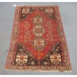 A hand-knotted Qashqai carpet,