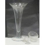 A tall fluted glass vase, 50cm high together with a 19th century navette shaped glass basket and a