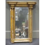 A small columnar framed giltwood mirror 68 x 50cm