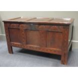 A 17th century inlaid oak three panel coffer with split hinge lid and carved decoration 60 x 104 x