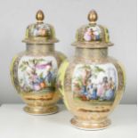 A pair of Dresden vases and covers, 19th / 20th century,