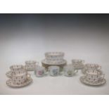 A Coalport part tea service, a copper lustre jug with a pink band, other lustre teaware, a pair of