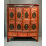 A large red laquer Chinese cabinet, 185 x 152 x 63cm